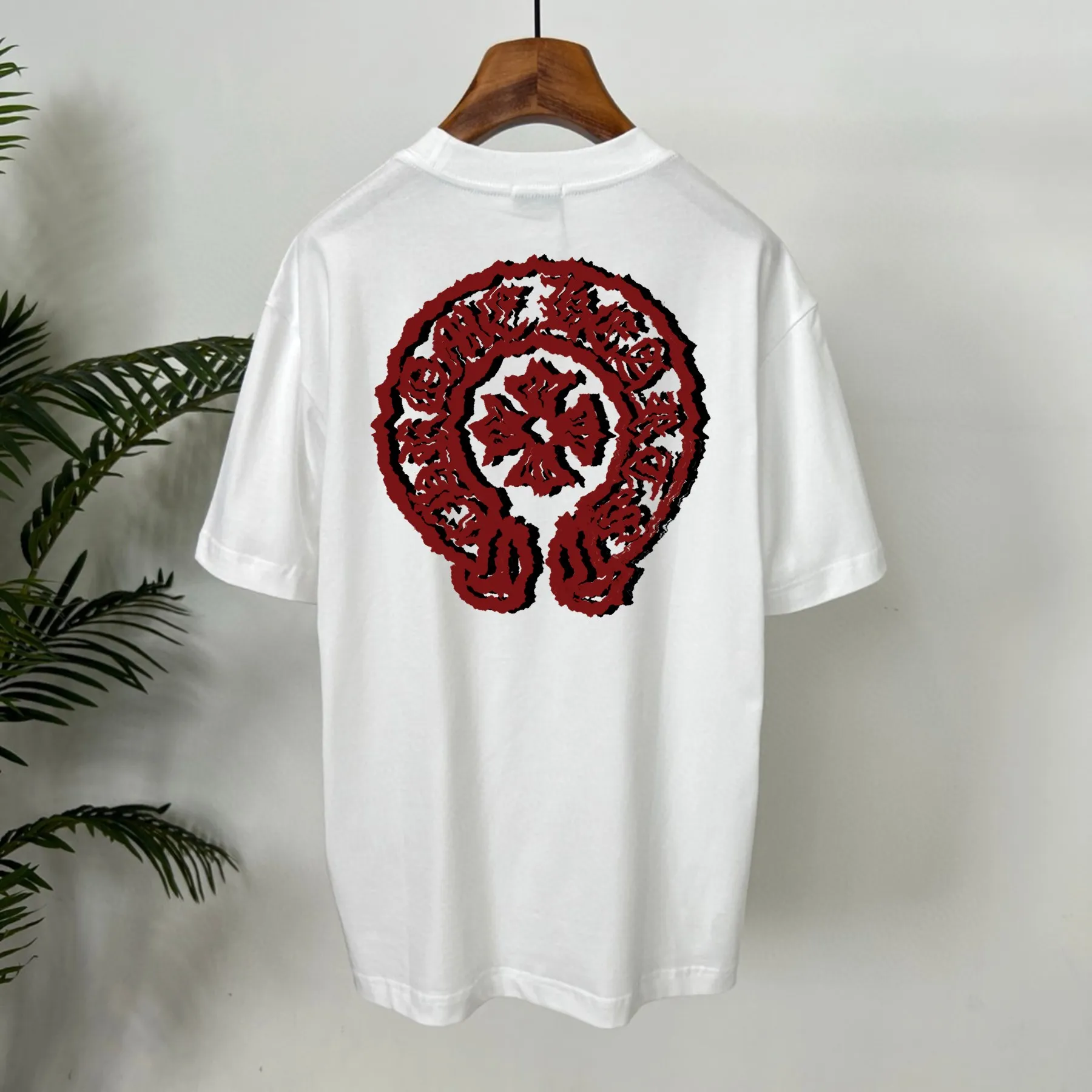 🅿️190 Crow Heart’s new summer T-shirt! This Sanskrit cross printed round neck short sleeves is simply a must-have for fashionistas. Salona cotton fabric is super comfortable, soft and skin-friendly, and has excellent breathability, making it perfect for summer wear. The Sanskrit cross print design on it is amazing, full of mystery and high-end, and the details are so exquisite that it makes people scream. It is worthy of Kroxin, and it vividly interprets the trend and personality. The loose fit is super friendly to all body shapes, covers the flesh and is comfortable, and looks good no matter how you wear it. Pair it with jeans and you'll look cool on the street. Pair it with sweatpants and you'll instantly look energetic and trendy. When you wear it and go out, you will feel like you are the spokesperson of fashion, and it will definitely turn heads. Color: black, white Size: S-2XL